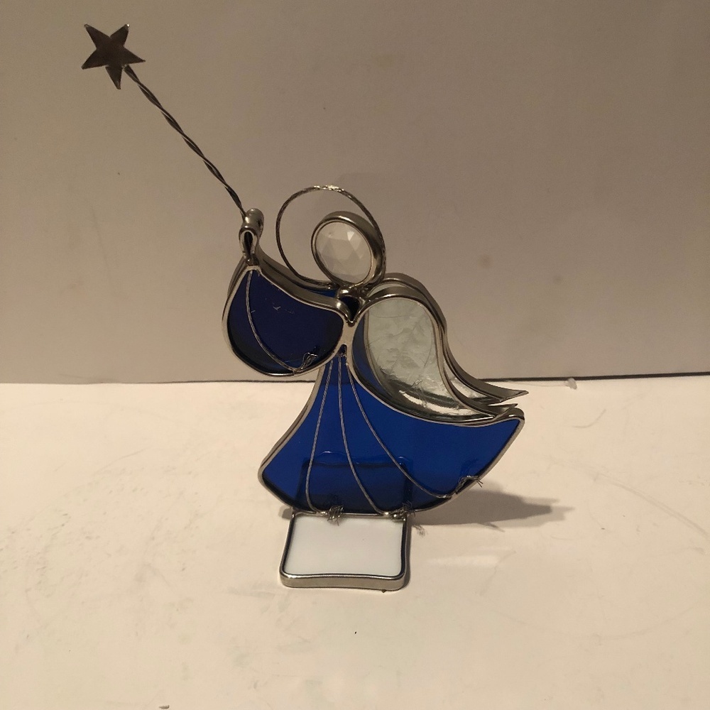 Adorable stained glass angel ready for your mantel. Used but like new